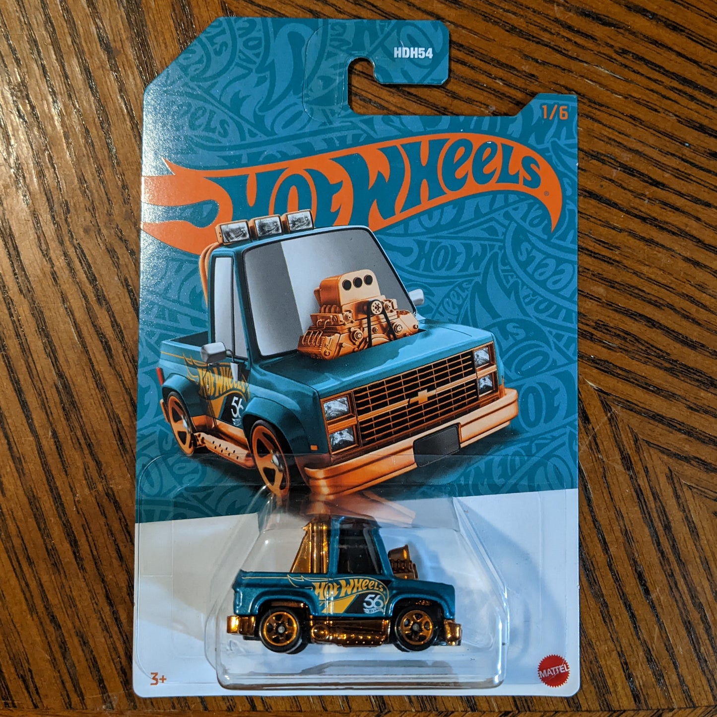 Toon'd '83 Chevy Silverado (Metalflake Teal) - 56th Anniversary: Green and Gold - Hot Wheels Basic (2024)