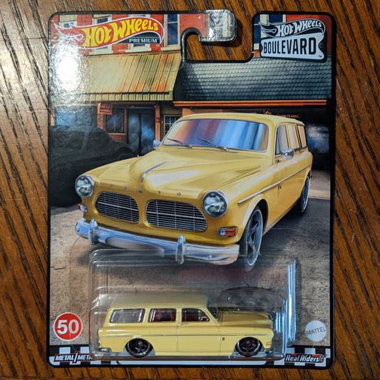 Volvo P220 Amazon Estate (Cream Yellow) - Boulevard - Hot Wheels Premium (2022)
